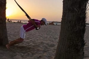 אימון TRX על חוף הים